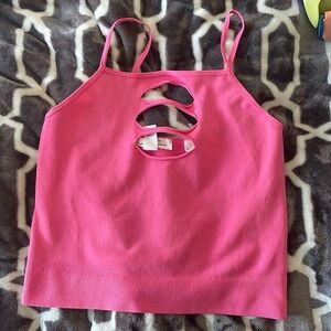 Pink tank with rips at boob area. Size L.
